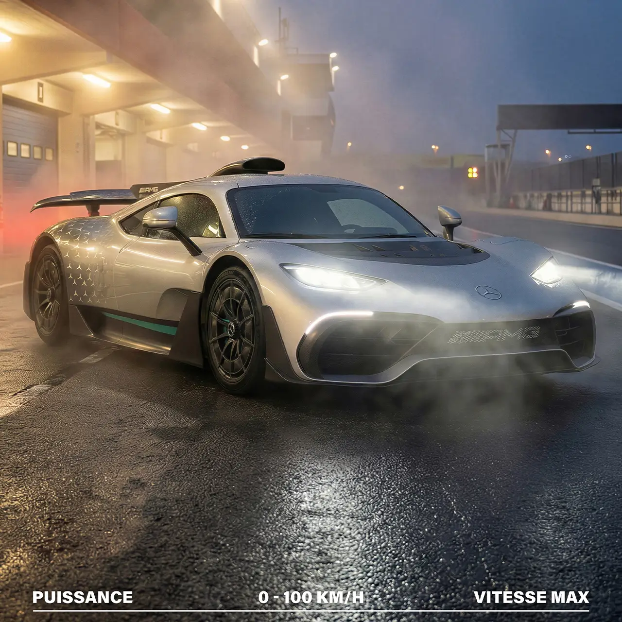 Gros plan avant Mercedes-AMG One phares allumés et détails aérodynamiques sous la pluie.